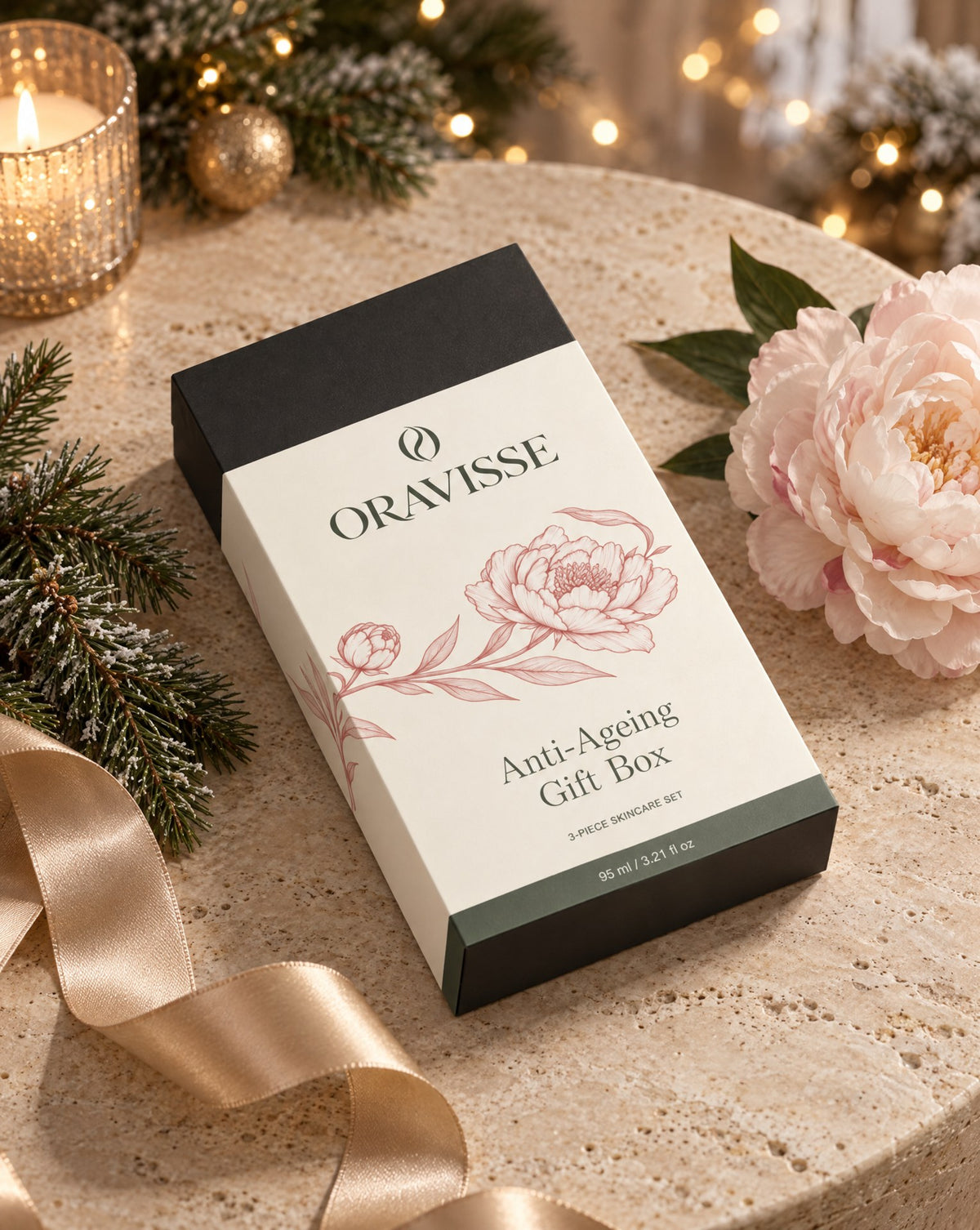 Oravisse botanical gift box with festive greenery, peony and champagne ribbon